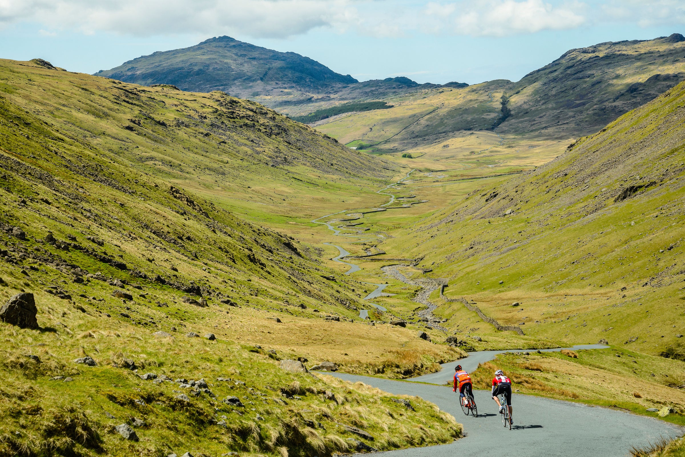Cyclists riding on a dirt trail